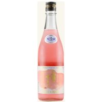 A beautiful bottle of pink sake. The glass is clear, showing a soft, strawberry shortcake pink sake inside (made with red yeast). Silver screwcap, and white label with some pink watercolor on it and the words, "Oze no yukidoke Rose" written in Japanese Kanji.