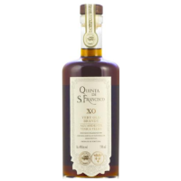 A fancy looking bottle of Quinta da Sao Francisco XO Aged aguardente. Dark amber colored liquid in a clear bottle with a wooden stopper on a cork. A white tape over the cork, and an off-white label.
