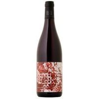 A 750ml bottle of wine in dark glass with a modern non-figurative red and white label on it from Krasna Hora Pinot Noir.