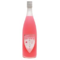 A soft pink liquid rests in a clear glass 720ml bottle of shochu called Koishiso Shochu
